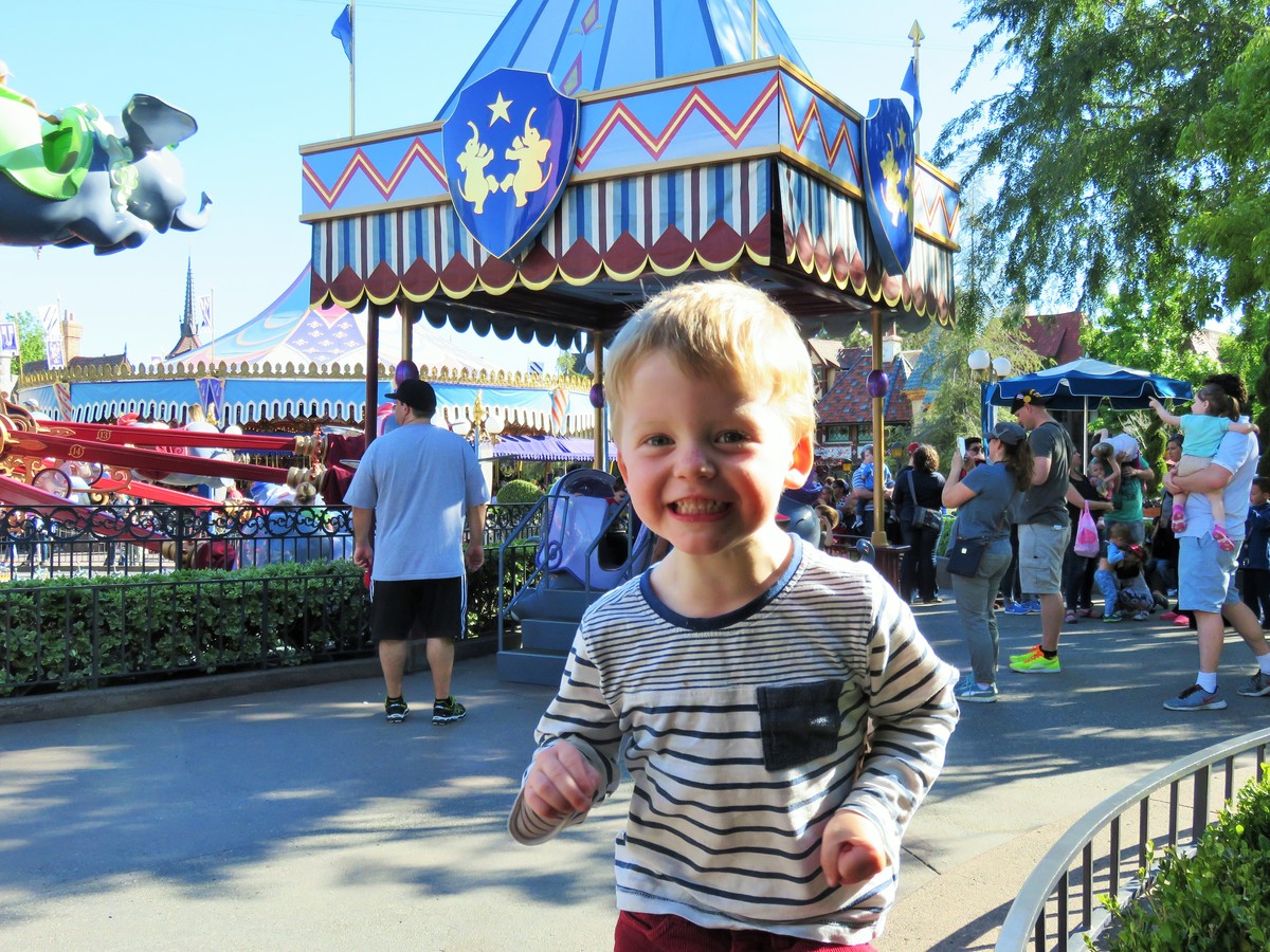 Toddler having fun at Disneyland.