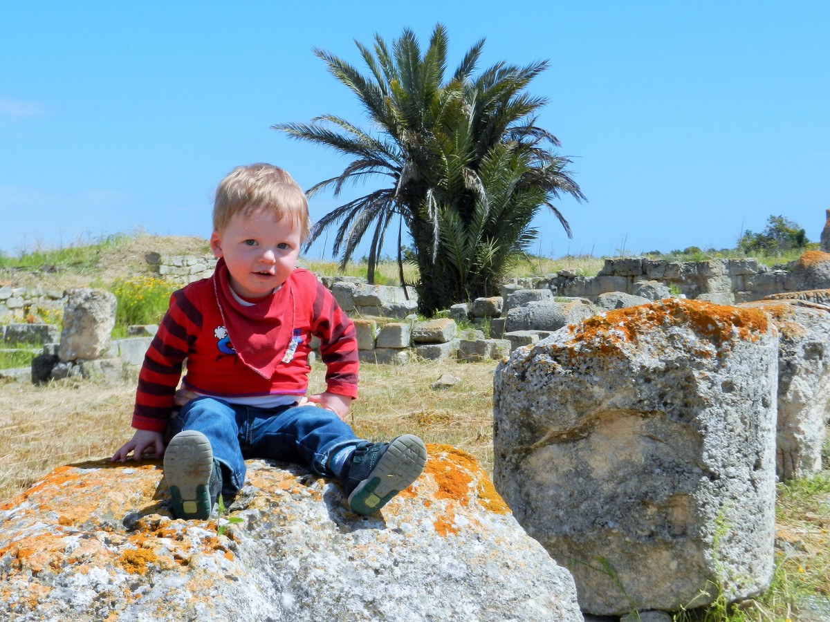 Toddler at ancient ruins in Salamis