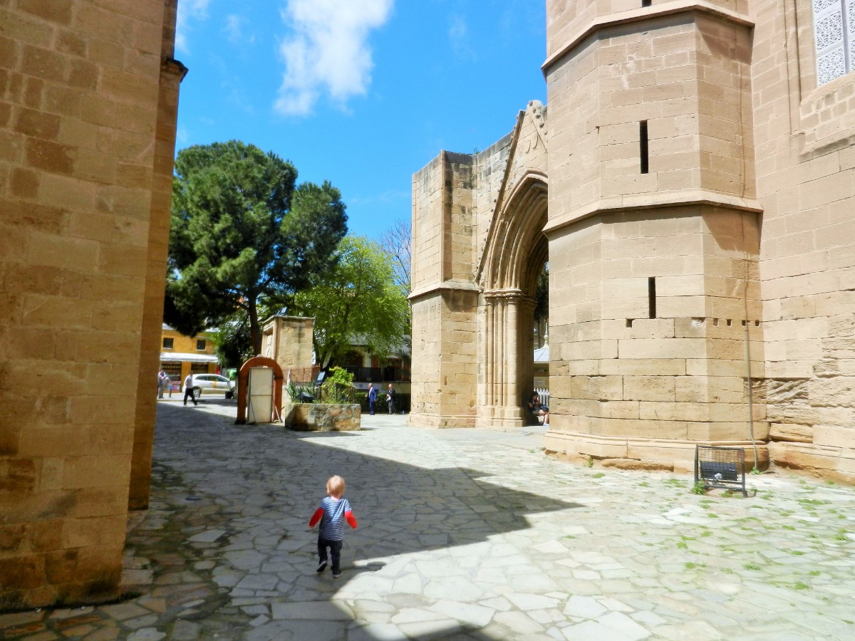 Toddler walking in Turkish side of Nicosia, Cyprus