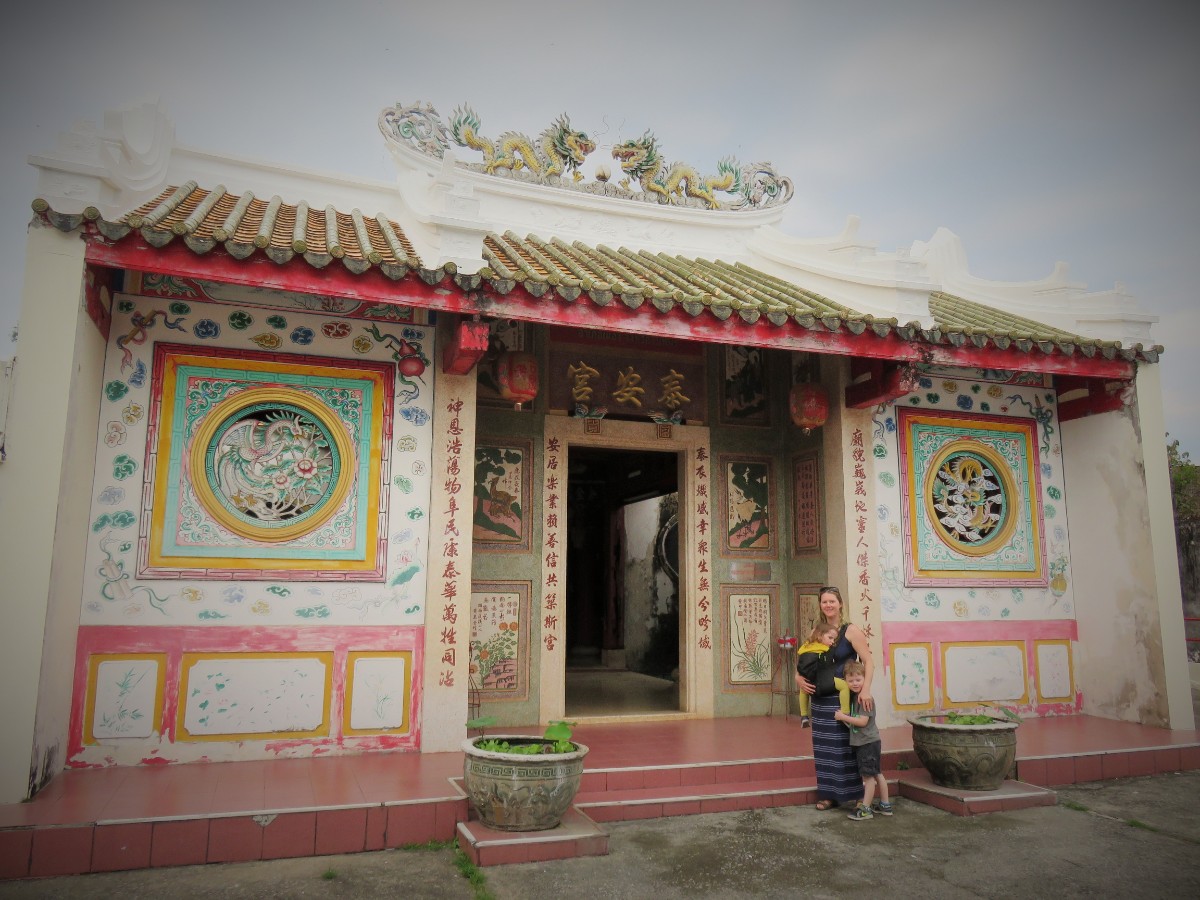 Family in front of Chinese Temple in Chanthaburi, Thailand