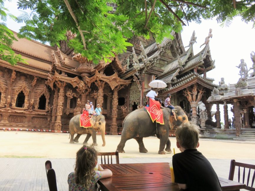 Kids watching elephant at Sanctuary of Truth in Pattaya, Thailand