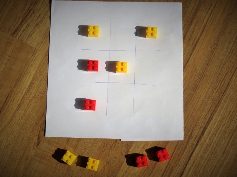 Lego blocks on a Noughts and Crosses board