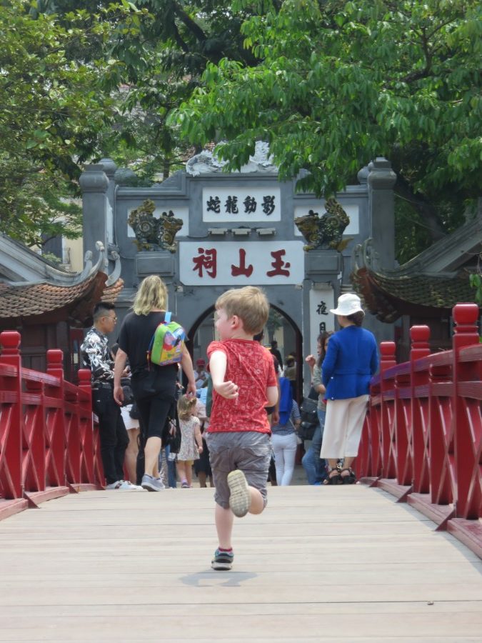 toddler running hanoi bridge