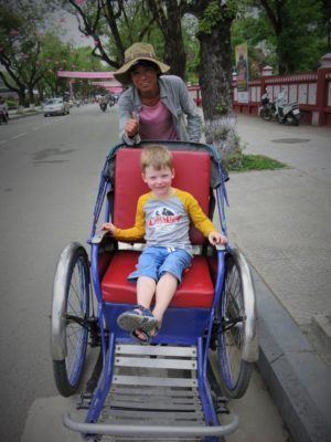 toddler in rickshaw Hue