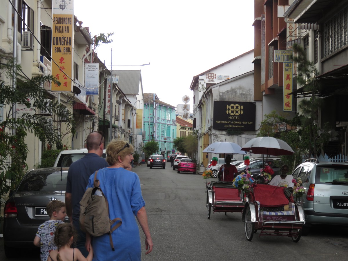 Penang street scene with kids