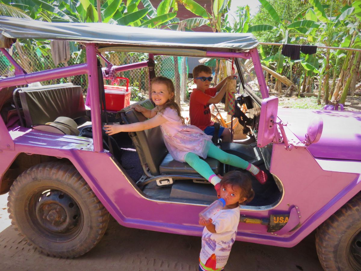 children in a purple jeep siem jeep cambodia